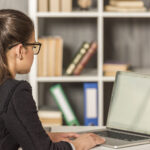 brunette-businesswoman-working-her-office